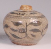 Lot 668 - A Chinese Ming period crackle glazed bottle...