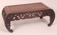 Lot 648 - A late 19th century Chinese carved 'rosewood'...