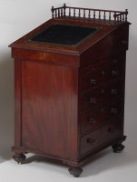 Lot 807 - A circa 1830 mahogany slopefront davenport,...