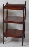 Lot 819 - A 19th century mahogany three tier whatnot, of...