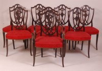 Lot 831 - A set of eight mahogany shield back dining...