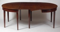 Lot 840 - A George III mahogany double D-end dining...