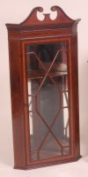 Lot 867 - An Edwardian mahogany hanging corner cabinet,...