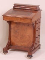 Lot 868 - A mid-Victorian figured walnut kneehole...