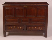 Lot 870 - A circa 1700 joined oak mule chest, the top on...