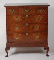 Lot 884 - An early 18th century figured walnut and...