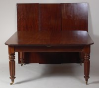 Lot 886 - A circa 1830 mahogany round cornered extending...