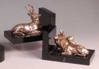 Lot 78 - A pair of Art Deco silvered metal and black...