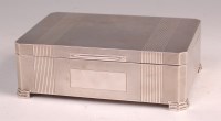 Lot 133 - An Art Deco style silver table cigarette box,...
