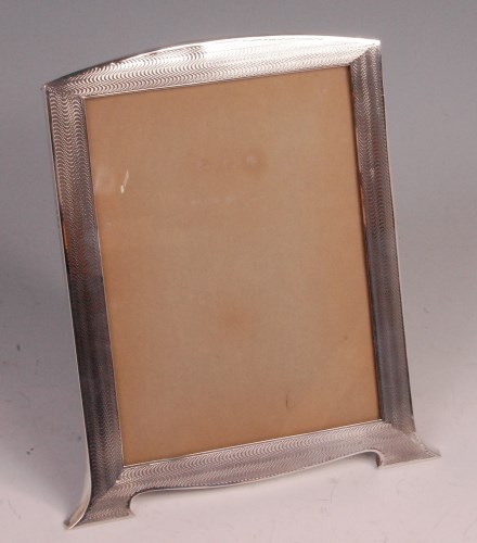 Lot 134 - An Art Deco silver photograph frame, having...