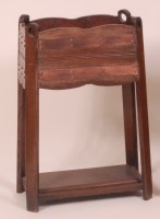 Lot 240 - An Arts & Crafts oak and copper bound two-tier...