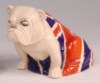 Lot 24 - A Royal Doulton ceramic model of a seated...