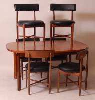 Lot 294 - A 1960s G-Plan teak dining suite, comprising;...