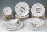 Lot 726 - # A Herend porcelain eight place setting...