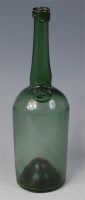 Lot 762 - An 18th century green glass wine bottle, with...