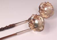 Lot 798 - *A George II silver toddy ladle, having shaped...