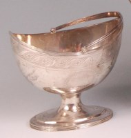 Lot 810 - *A George III silver pedestal basket, of oval...