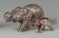 Lot 818 - *A modern silver elephant ornament,...