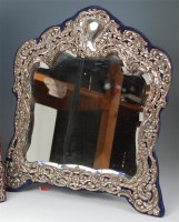 Lot 842 - # An Edwardian silver mounted easel dressing...