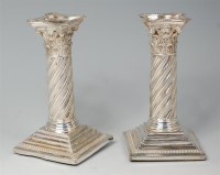 Lot 852 - A pair of late Victorian silver candlesticks,...