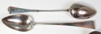 Lot 856 - A pair of late Georgian silver stuffing spoons,...
