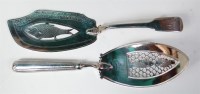 Lot 859 - A George IV silver fish slice, in the Fiddle...
