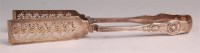 Lot 887 - A pair of George IV silver asparagus tongs, in...