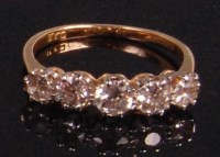 Lot 906 - A ladies 18ct gold five diamond dress ring,...
