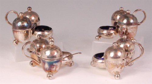 Lot 797 - *Two matched pairs of silver table cruets,...