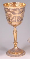 Lot 808 - *A medieval style silver gilt chalice, the...