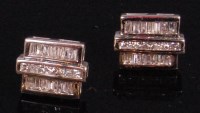 Lot 949 - A pair of contemporary 14ct white gold and...