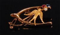 Lot 951 - An Edwardian 15ct gold wishbone brooch, set...