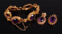 Lot 960 - A 14ct gold and amethyst set bracelet with...