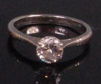 Lot 966 - A ladies platinum diamond solitaire ring, the...