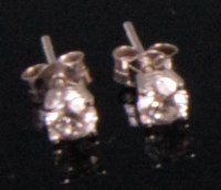 Lot 976 - A pair of contemporary 18ct white gold diamond...
