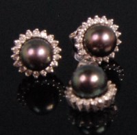 Lot 977 - A pair of contemporary white metal grey pearl...