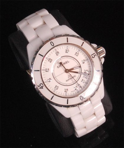 Lot 988 - A ladies Chanel J12 white ceramic bracelet...