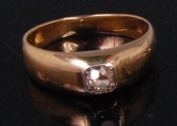Lot 989 - A gents yellow metal diamond solitaire ring,...