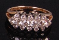 Lot 993 - A ladies 14ct gold diamond dress ring,...