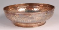 Lot 886 - A George V hammered silver footed bowl, having...