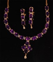 Lot 919 - An 18ct gold amethyst and diamond necklet with...