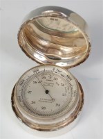 Lot 1065 - A George V silver cased pocket barometer, by E...