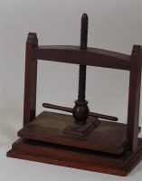 Lot 1082 - A 19th century mahogany bookpress, with rise...