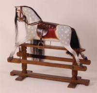 Lot 1085 - A Lines Bros dapple-grey rocking horse on...