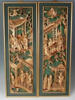 Lot 1098 - A pair of Chinese carved and painted giltwood...