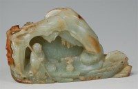 Lot 1106 - A Chinese celadon jade boulder carving, worked...