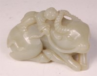 Lot 1112 - A Chinese carved and polished celadon jade...