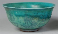 Lot 1121 - A Chinese Ming dynasty green glazed pottery...