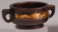 Lot 1131 - A Chinese bronze and gilt bronze censer, with...