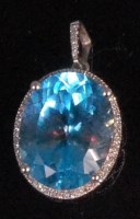 Lot 971 - A contemporary 14ct white gold blue topaz and...